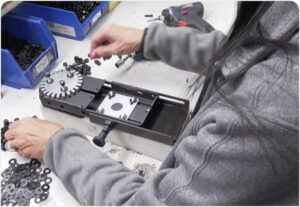 A person operating a machine at Gambler Johnson.